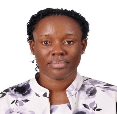 A smiling photo of Associate Professor Winifred Tarinyeba Kiryabwire