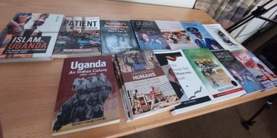 Photograph of books on Uganda.