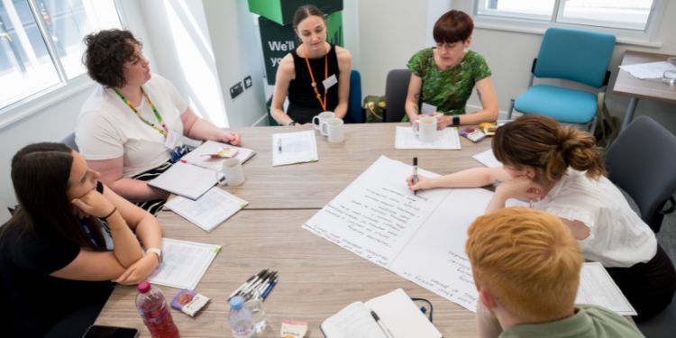 People working collaboratively at a table