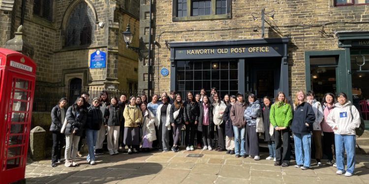 Group of students standing outside the Old Post Office Haworth