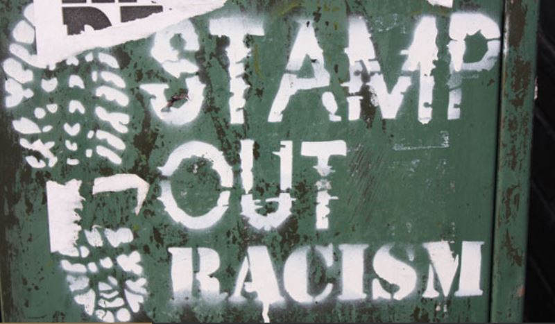 Stamp Out Racism spray paint