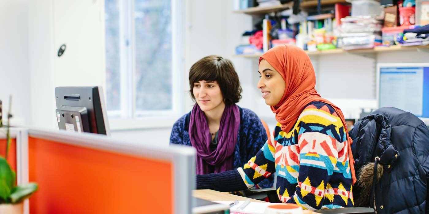 Postgraduate research students studying