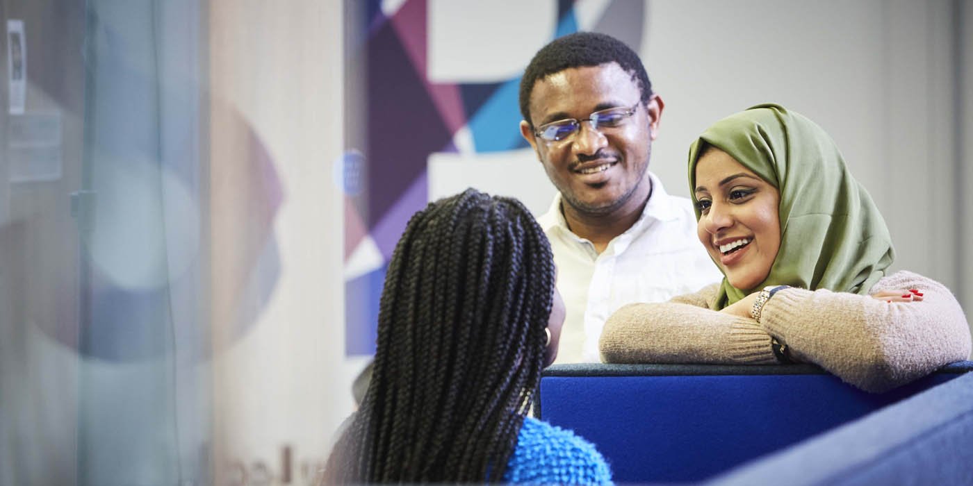 Postgraduate students in the Social Sciences building