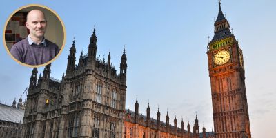 Picture of Houses of Parliament. Smiling photo of Prof Sheehan in a circle in top left.