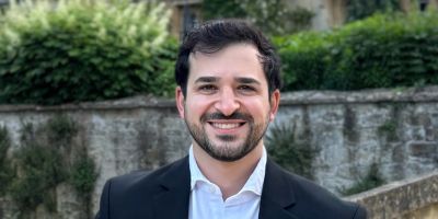 Professor Ignacio Cofone, expert in AI regulation and data protection law, smiling in a professional portrait.