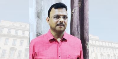 Bikrama Keshari Mohaptra in a pink shirt