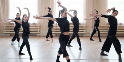 A group of dancers in a dance studio