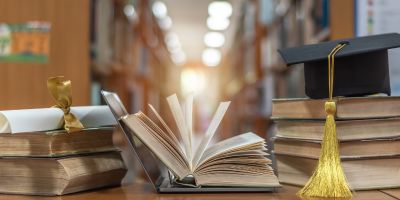Understanding postgraduate awarding gaps in higher education