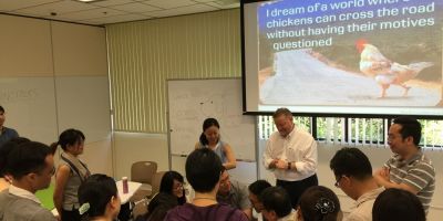 Photo of Roger Slee leading a workshop at a Summer School (Hong Kong University). Photo courtesy of Simon T.M. Ng.