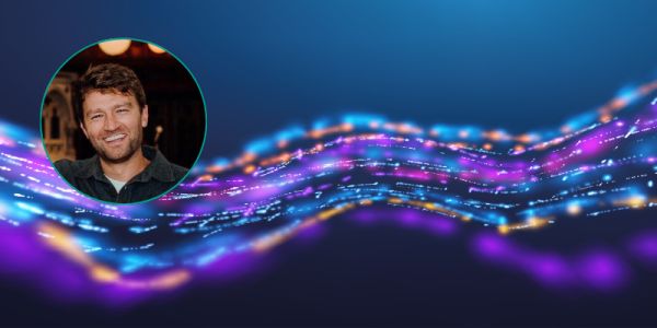 Background of a swirly pattern made out of tiny lights. Circle with smiling photo of Christopher Robinson