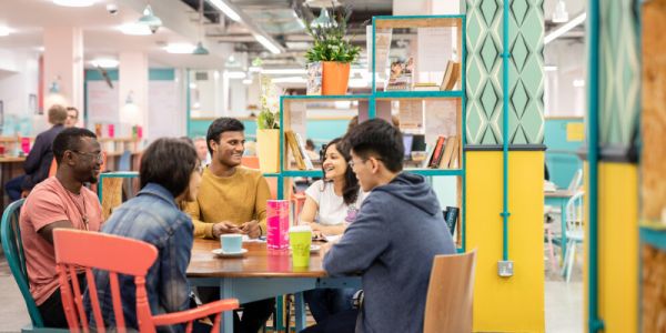 Students chatting in a coffee shop in the University of Leeds student union