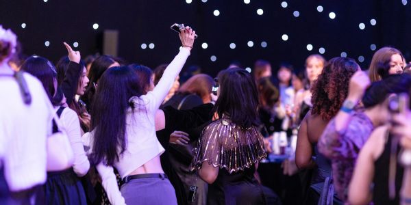 A group of people dancing.