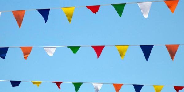 Multicoloured flags outside the students union