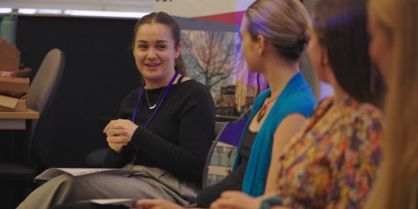 Staff talking to students about careers