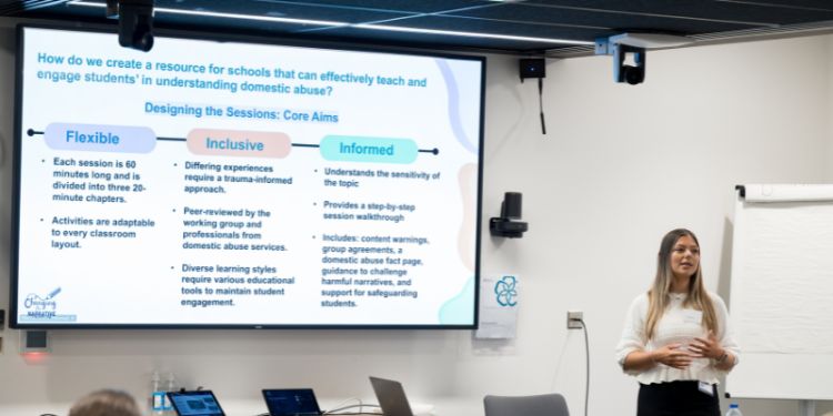 Ellie McAnulty (research assistant) presenting