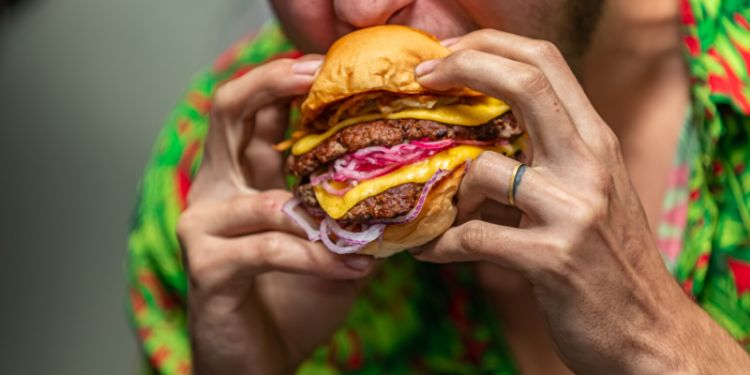 Woman eating a burger