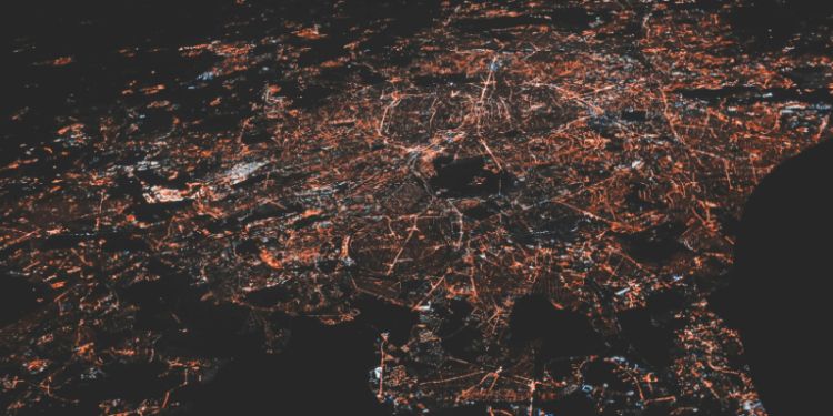 Aerial view of a lighted city