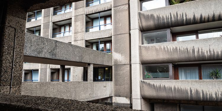 Photograph of a block of concrete flats in Brutalist style. 