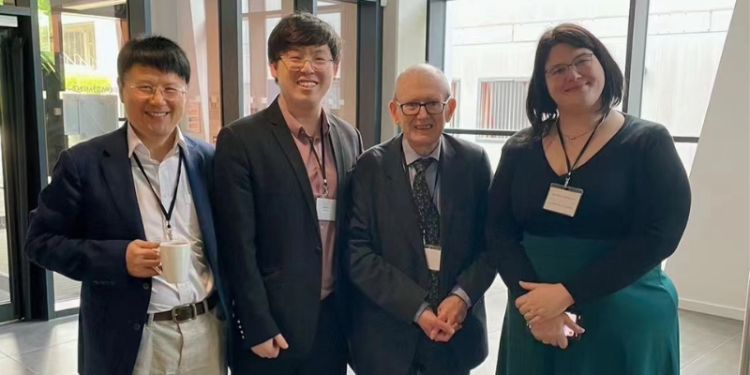Your sentence is almost correct but could benefit from slight rephrasing for clarity:

&quot;Shuaihao (second from left) stands with his supervisors, (from left to right) Dr Zinian Zhang, Professor Gerard McCormack, and Dr Oriana Casasola. They are smiling.