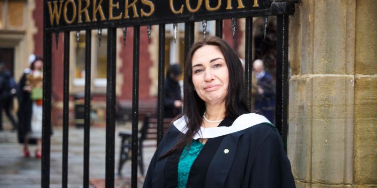 Anti-knife crime campaigner graduates with Masters in Social Research