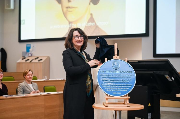 Vice-Chancellor Professor Simone Buitendijk unveiling a Leeds Civic Trust blue plaque dedicated to Esther Simpson during the opening ceremony of the Esther Simpson Building. 