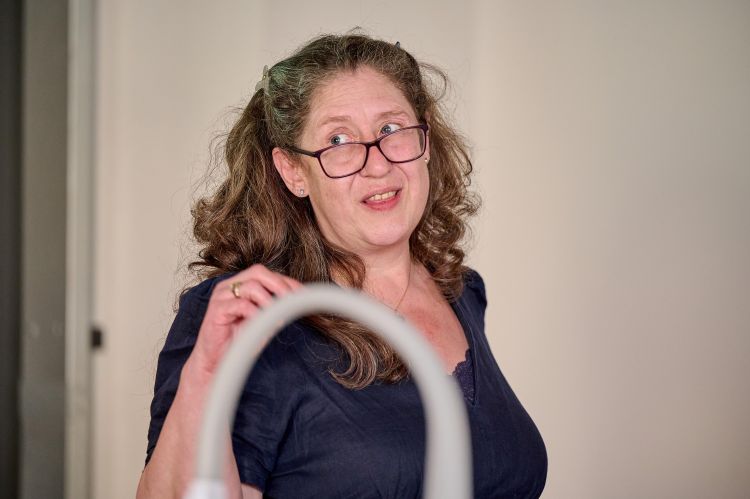 Photograph of Professor Tracey answering audience questions.