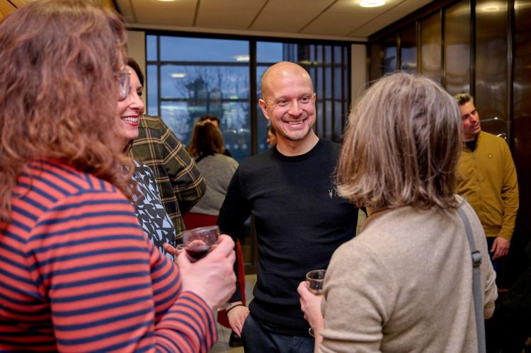 Professor Davis speaking with colleagues at the drinks reception.