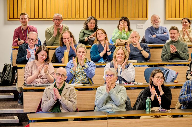 Audience applause as Professor Pina-Sánchez concludes his lecture.