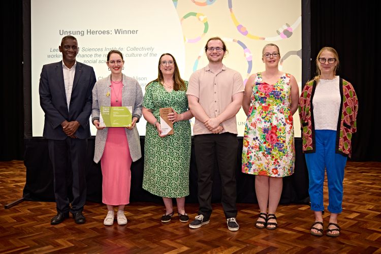 Receiving the Award for Unsung Heroes from Dr Mark Richards (far left) and Professor Cat Davies (far right) are (from left) Sophie Rowan, Cheryl Harris, Elliot Payne and Alison Lundbeck.