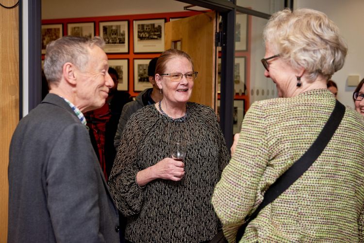 Professor Pecorari celebrating with colleagues at the reception.