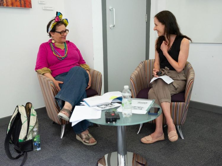 Maggie Kubanyiova (right) and her collaborator, an artist and poet Sophie Herxheimer (left) in a conversation on mobilising language creatively to reduce stigma. Photograph by Mark Epstein