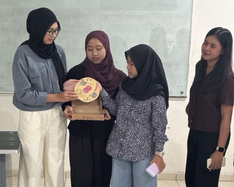 Students presenting their "pizza story" to the class