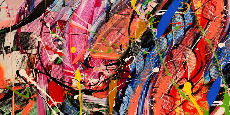 An abstract collage of brightly coloured paint on canvas