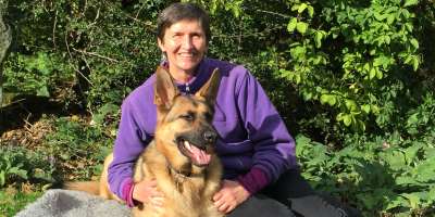 Professor Anna Lawson with guide dog Finn