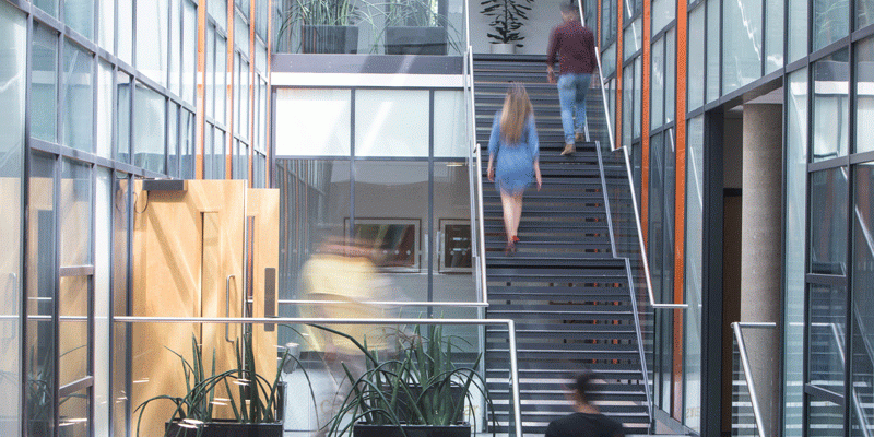 students on staircase in Liberty Building